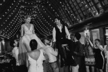 Adam-Anna-Lifted-In-Chairs-Dance-Floor