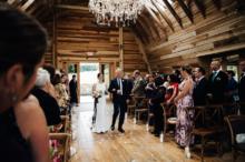 Cliffside-Barn-Ceremony-Caitlin-Walking-Down-Isle