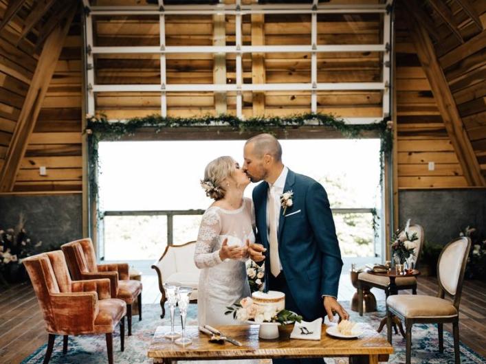 Bride-Groom-Cut-Cake-Kiss-Cliffside-Gallery