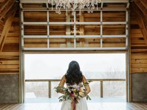 Bride-With-Bouquet-Under-Chandelier