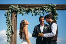 Bride-Groom-Vows-Under-Arbor (1)