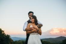 Wedding-Couple-Embrace-Mountain-Sky (1)