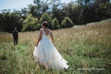 Bride-Walks-to-Groom-in-Meadow