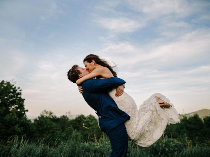 Groom-Lifting-Bride-Mountain-Kiss-Katrina-Fred
