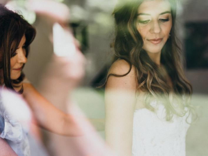 Mom-Zipping-Bride-Dress-Window-Photo
