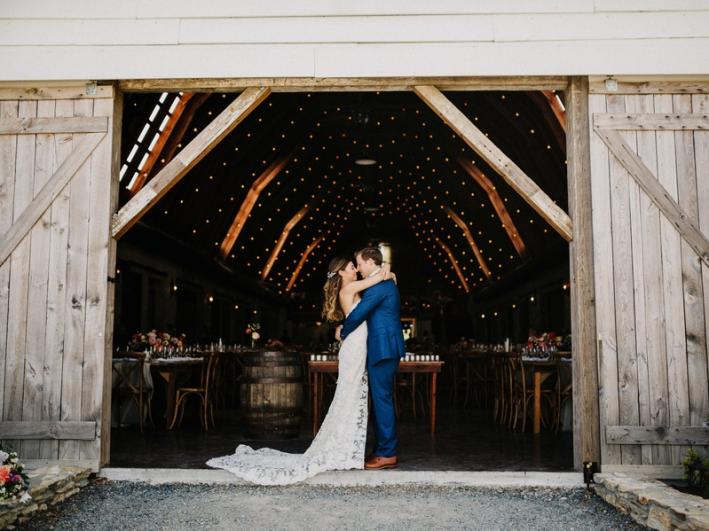 Wedding-Couple-Embrace-Front-Overlook-Barn