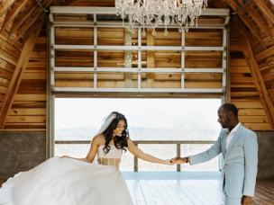 Bride-Groom-Dancing-Under-Chandelier