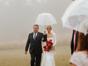 Father-Walking-Bride-Down-Isle-Clear-Umbrella