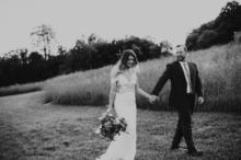 Bride-Groom-Walk-Across-Meadow