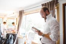 Groom-Reading-Letter-Polishing-Room-MW