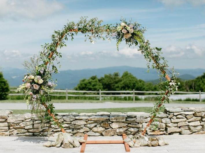 Greenery-Covered-Ceremony-Awning-Overlook