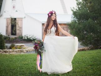 Bride-Holding-Wedding-Dress-Hayden-Olivia-Bridal