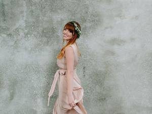 Bride-Posing-Overlook-Barn-Wall 